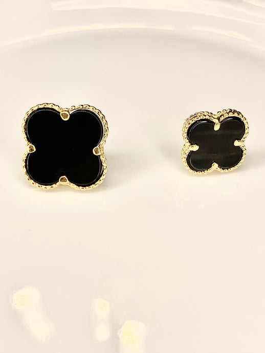The left earring is the size of Onyx Clover Earring